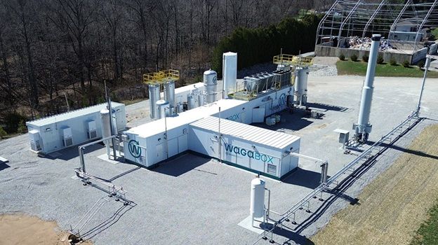 ** Industrial facility with pipes converting landfill gas into renewable natural gas in Indiana