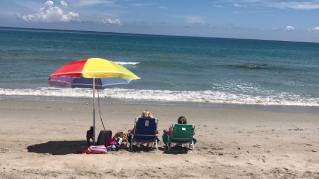 County Worker Saves Drowning Teen With Surfboard at Beach