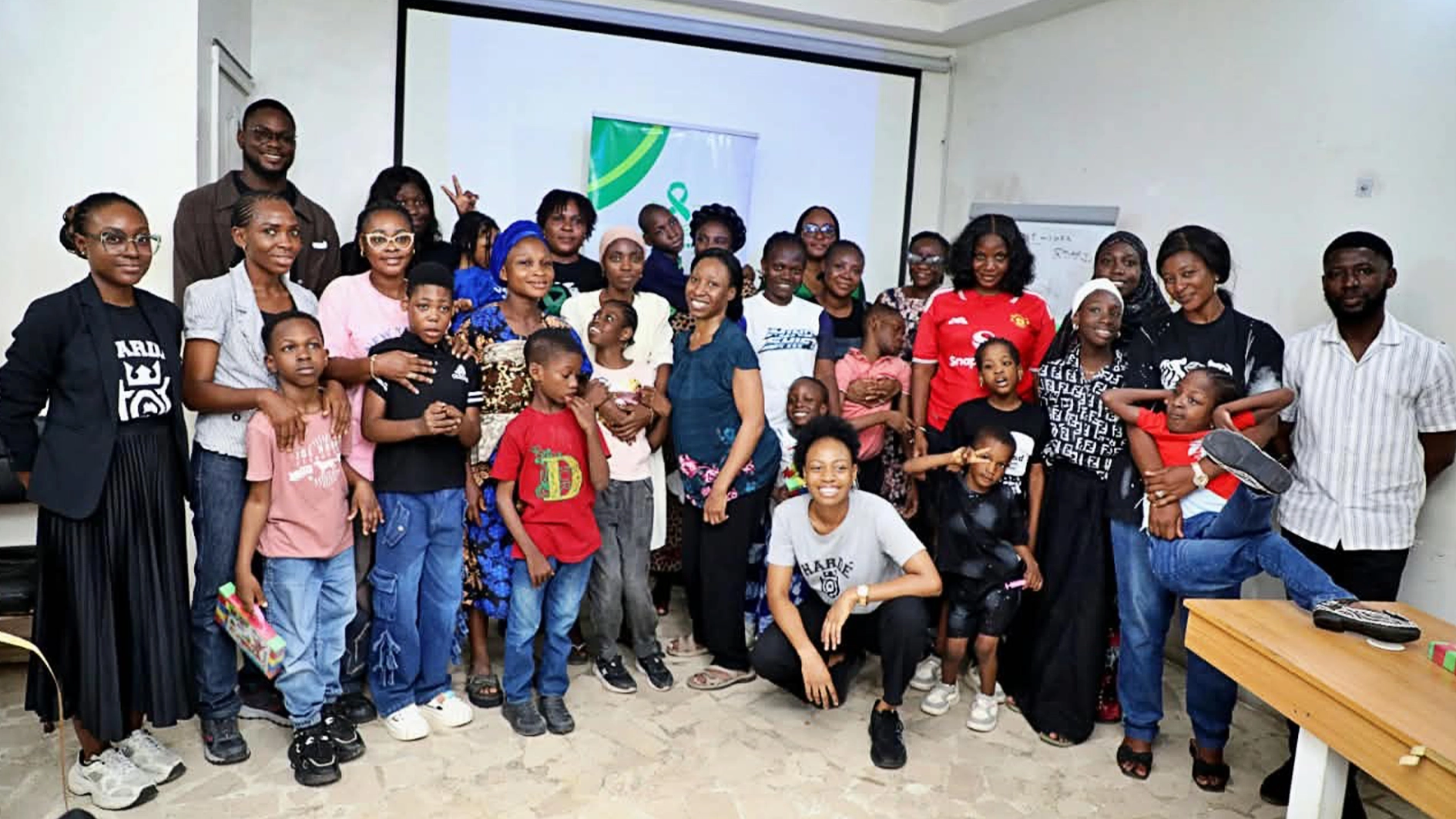 Child with cerebral palsy using eye-tracking technology on Chromebook to communicate in Lagos
