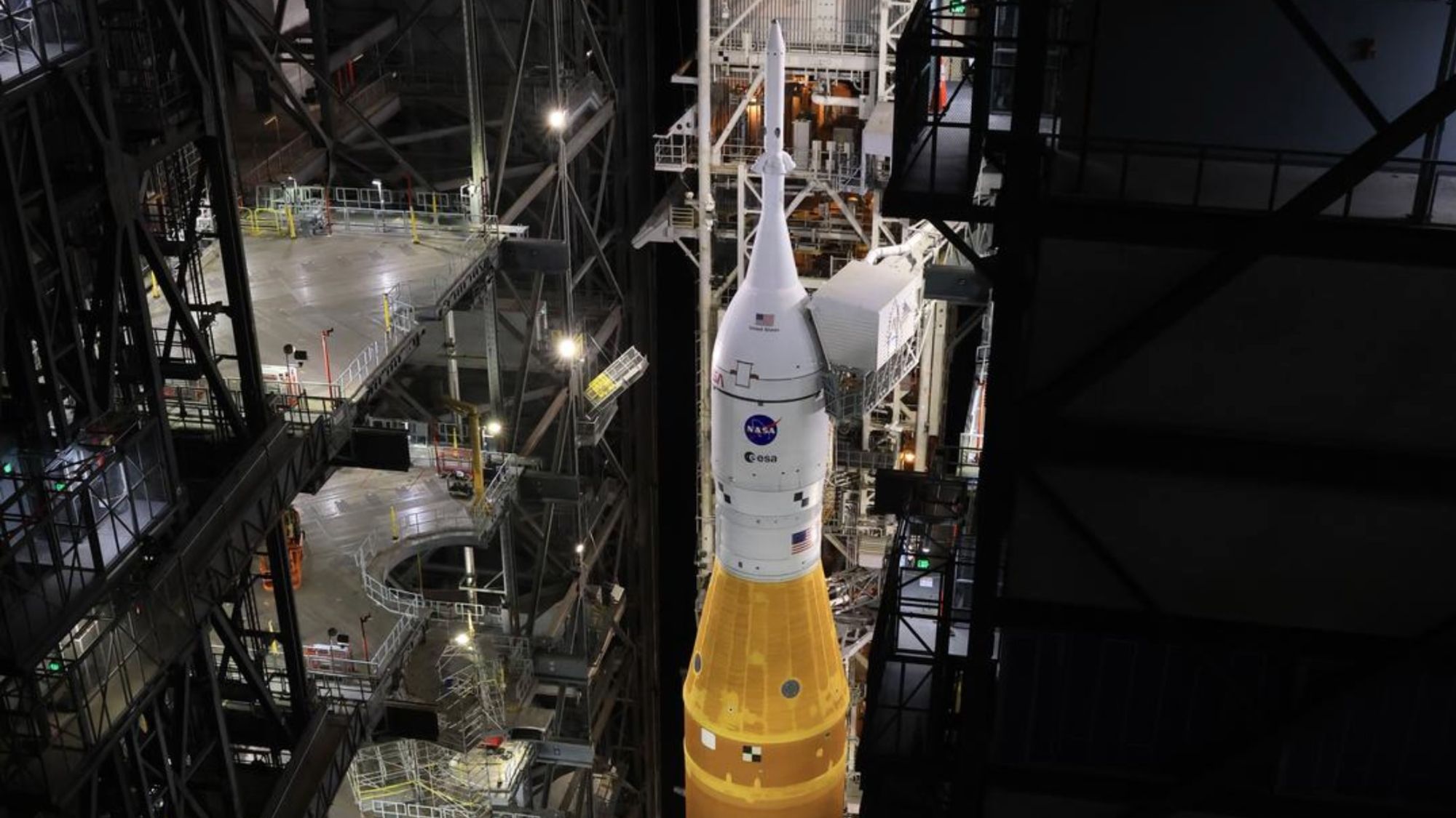 NASA's Artemis 2 Space Launch System rocket standing vertical inside Vehicle Assembly Building at Kennedy Space Center