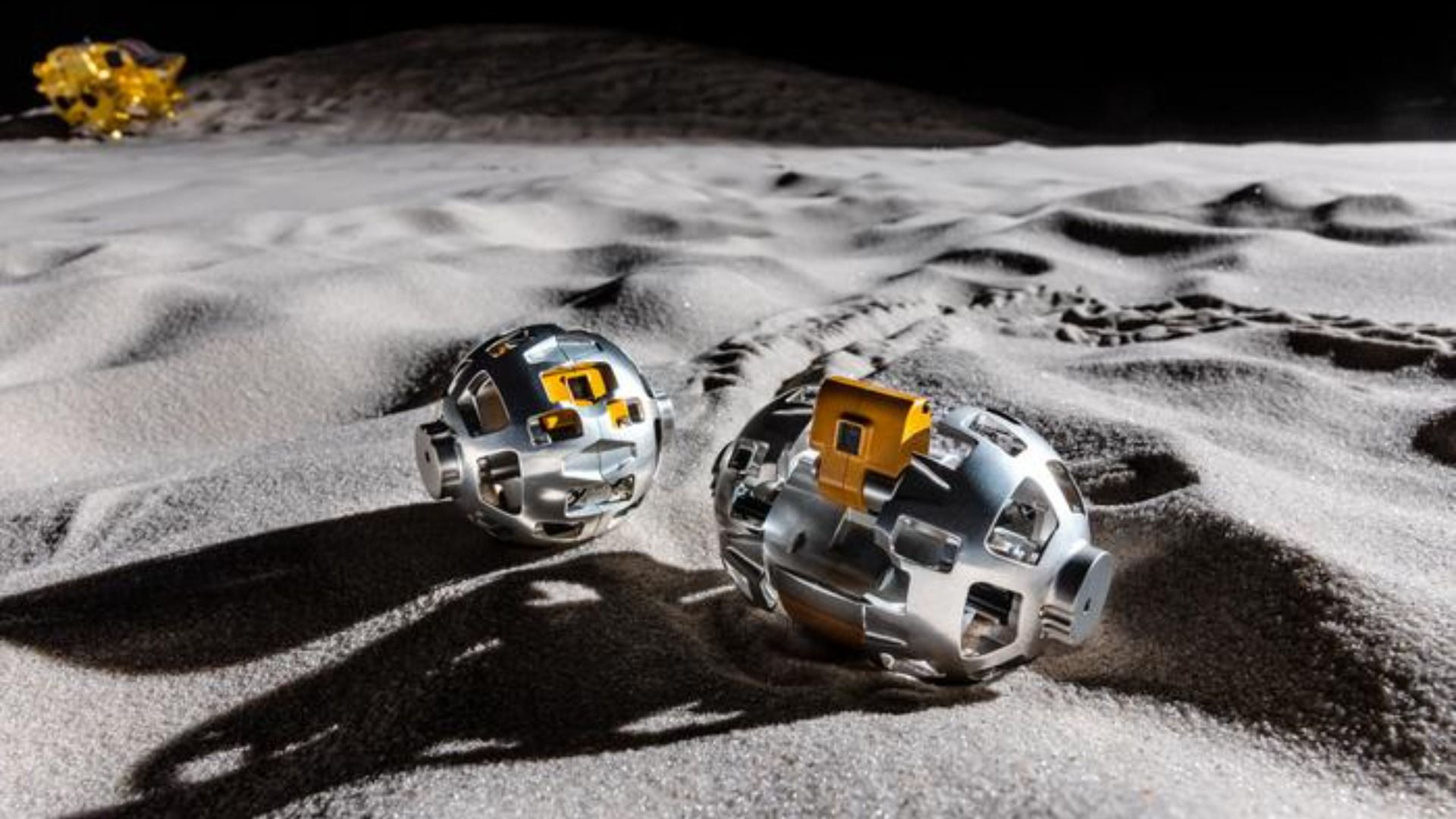 Tennis ball-sized SORA-Q robot transforming from sphere to wheeled rover on moon's surface