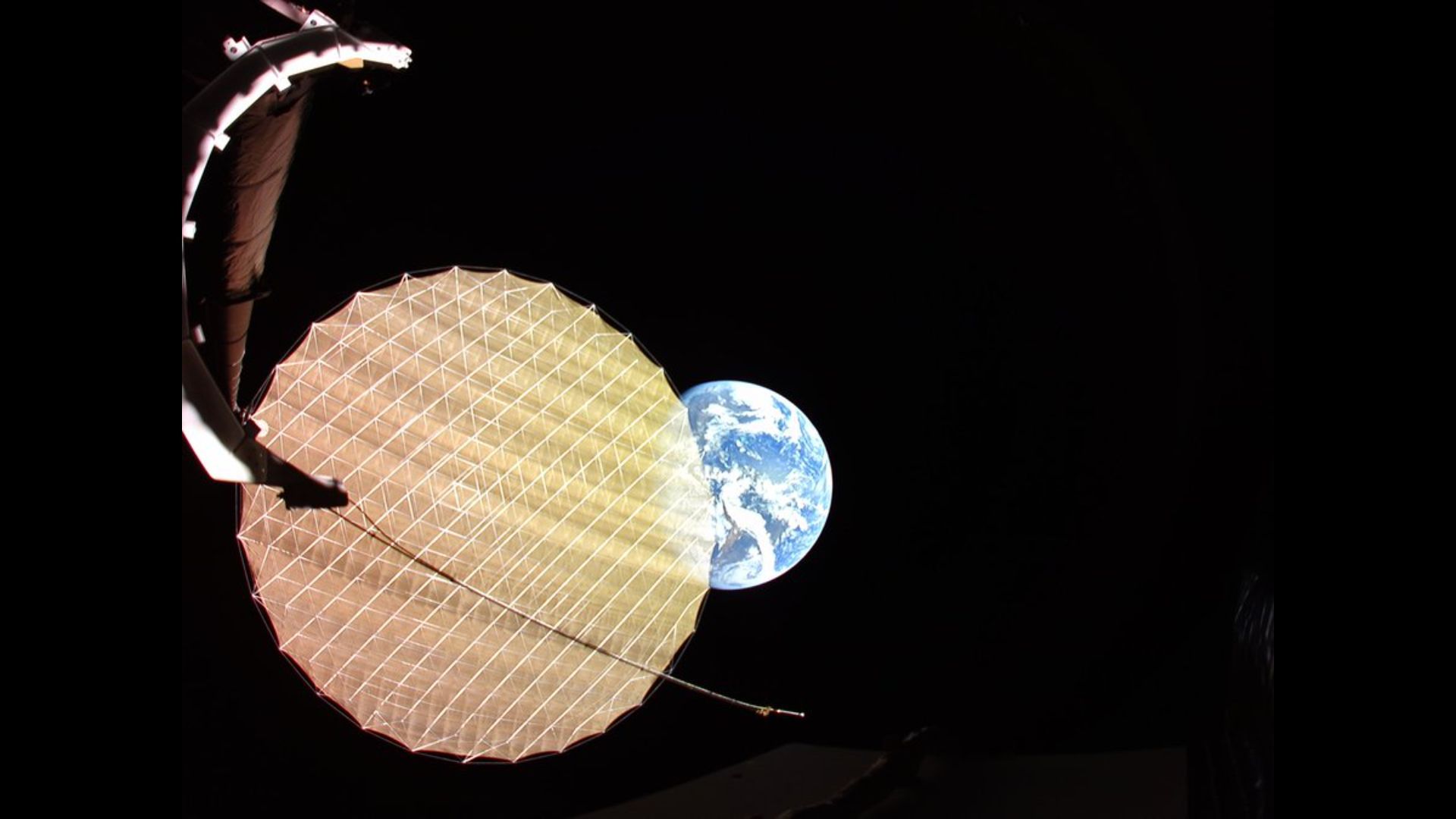 Satellite Deploys Giant Reflector 22,000 Miles Above Earth