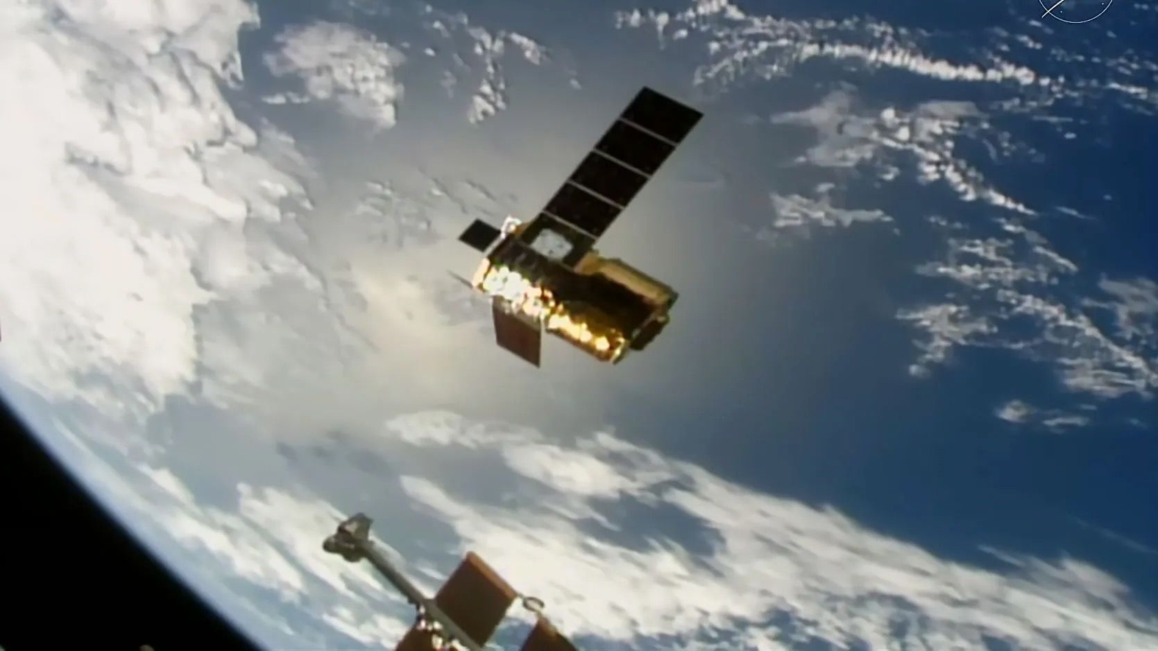 Japan's HTV-X1 cargo spacecraft being released from the International Space Station's robotic arm above Earth