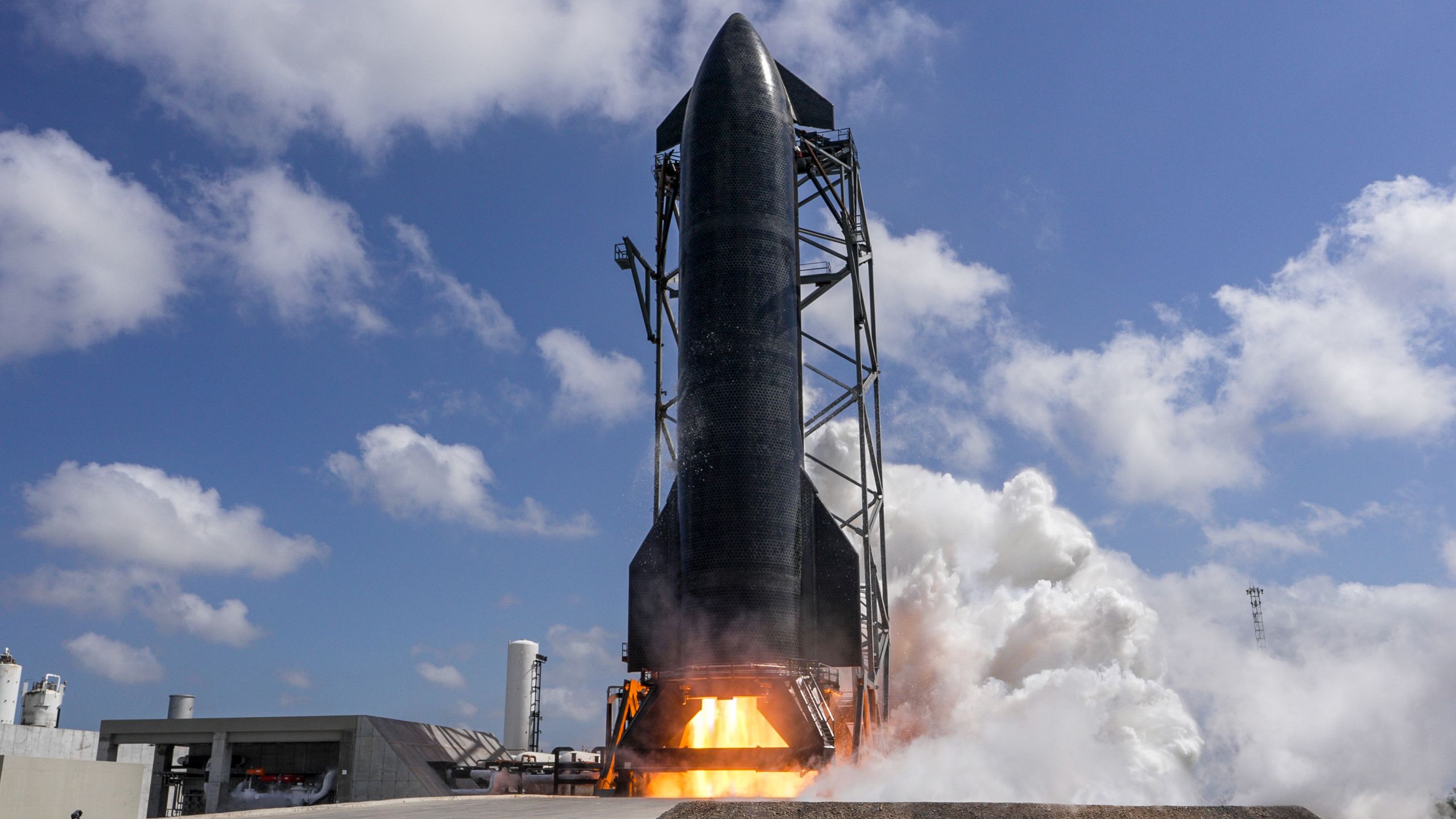 SpaceX Starship Version 3 rocket conducting static fire engine test on launchpad