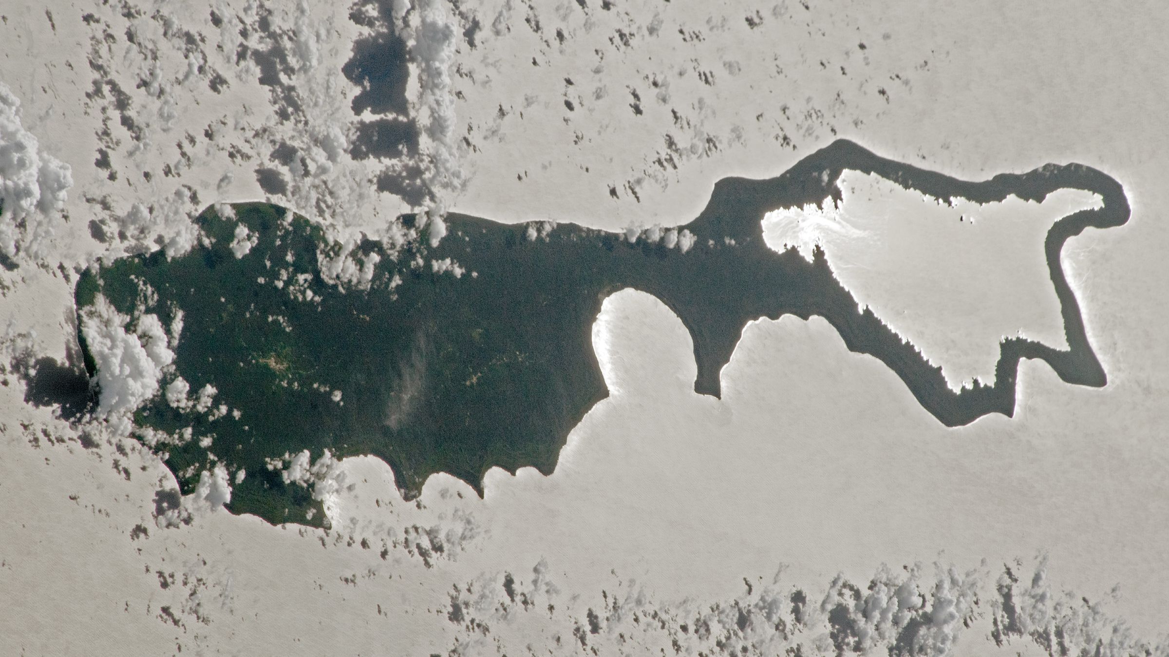 Rare Sunlight Effect Turns Pacific Island Into Silver Mirror