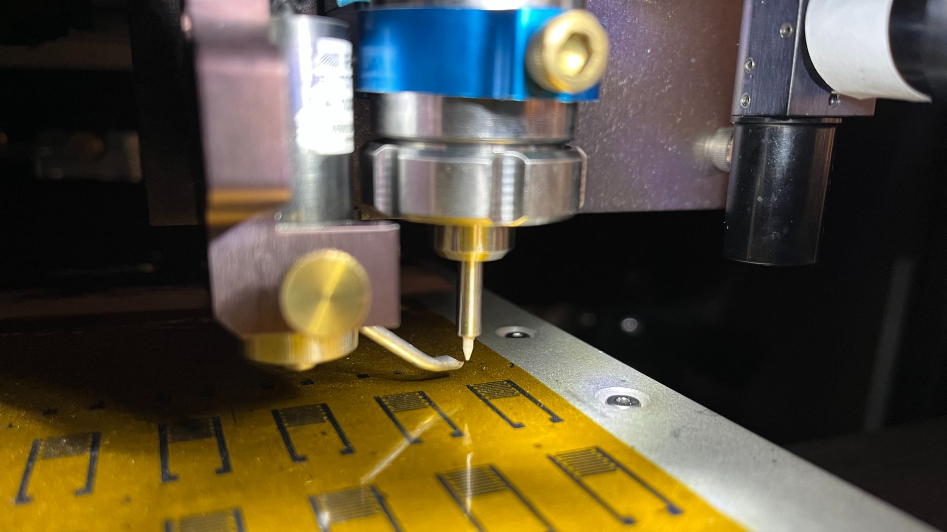 Printed Artificial Neurons Talk to Real Brain Cells
