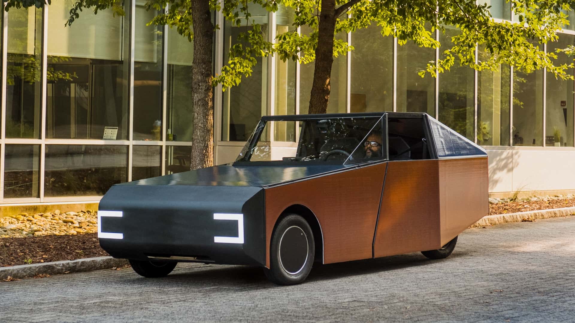 Orange solar panel covered prototype car developed by Clemson University students for BMW