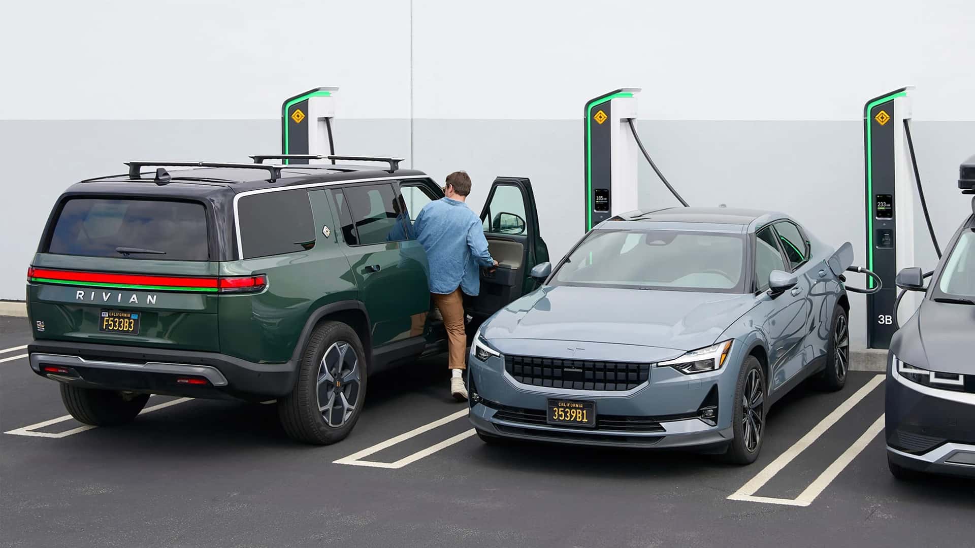 Rivian DC fast charging station with single-cable design in outdoor setting