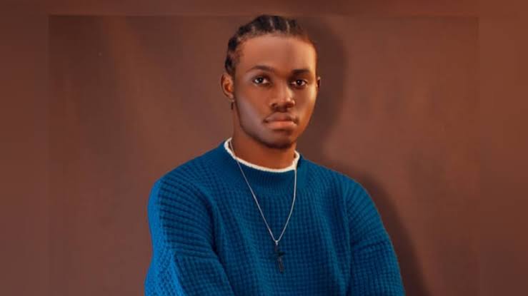 Young Nigerian content creator Ugochukwu Emmanuel smiling while filming in Lagos
