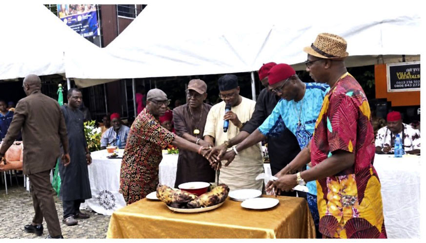Awka community members in colorful traditional Igbo attire celebrating New Yam festival in Lagos