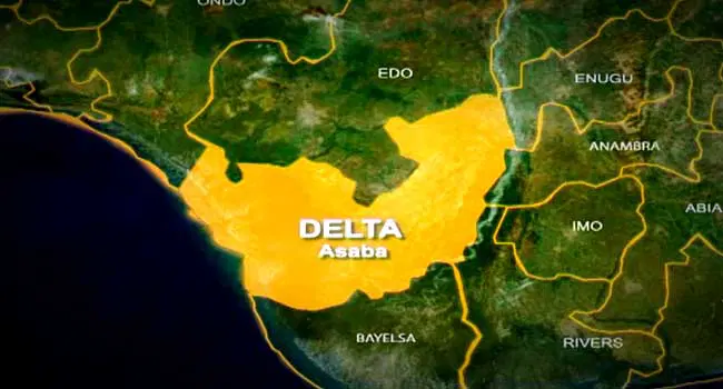 Traditional dancers and community members gathered in colorful celebration in Delta State Nigeria