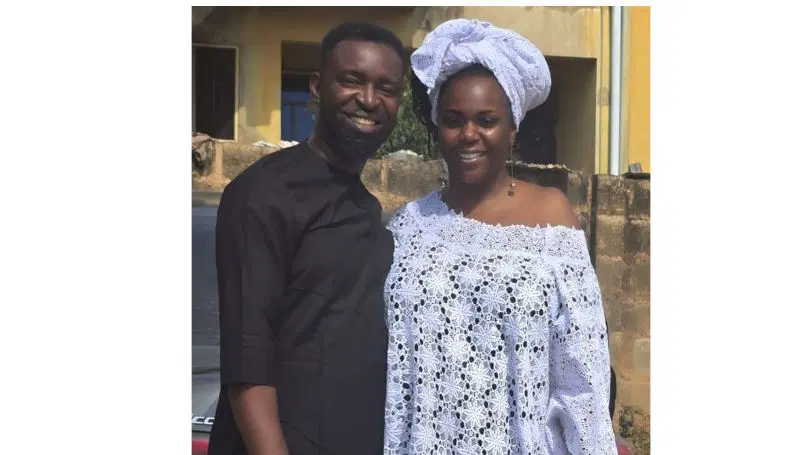 American woman and Nigerian husband smiling together celebrating their cross-continental love story and marriage