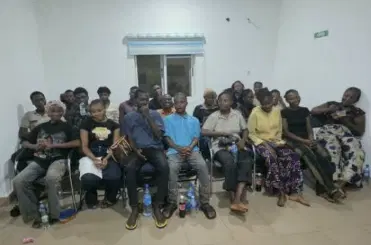 Group of rescued Nigerian youth service corps members arriving safely at government facility