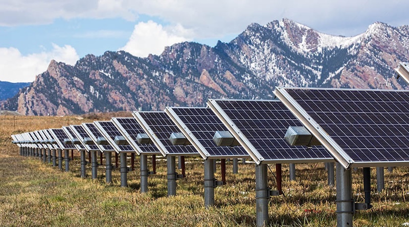 Solar panels installed across American landscape capturing sunlight for renewable electricity generation