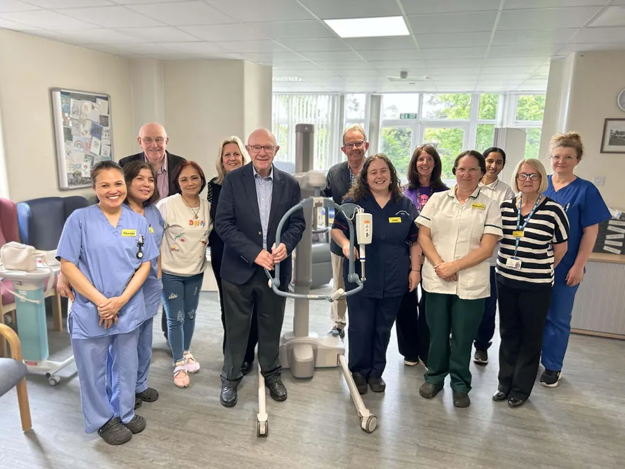 ** Hospital staff and fundraisers pose with new patient hoist equipment at Exmouth Hospital