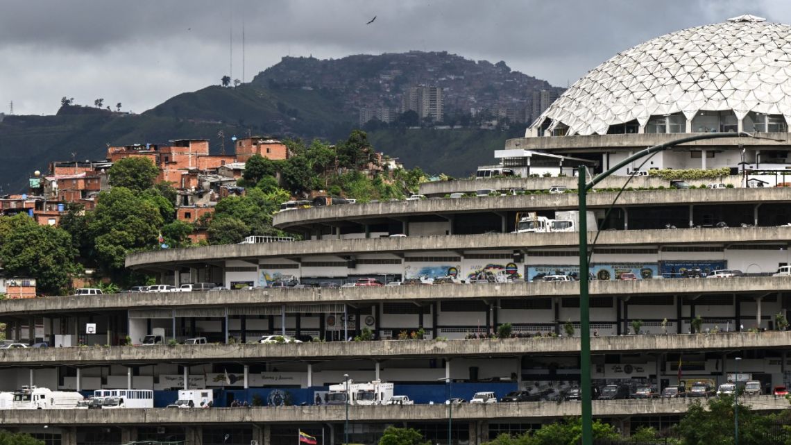 Families gathering outside El Helicoide prison in Caracas awaiting release of political prisoners