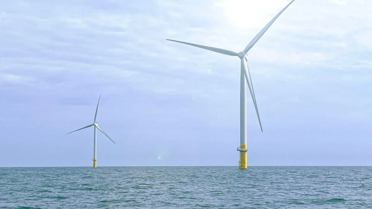 Solar panels and wind turbines generating clean renewable electricity across American landscape
