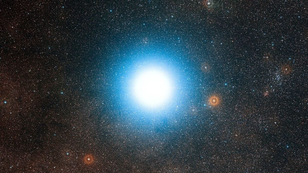 Artist rendering of small spacecraft traveling through deep space toward distant stars