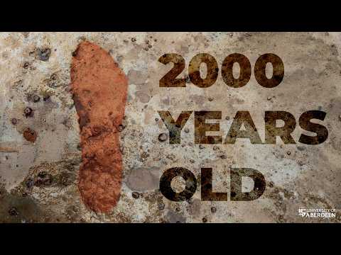 Ancient human footprints preserved in clay on Scottish beach before being washed away