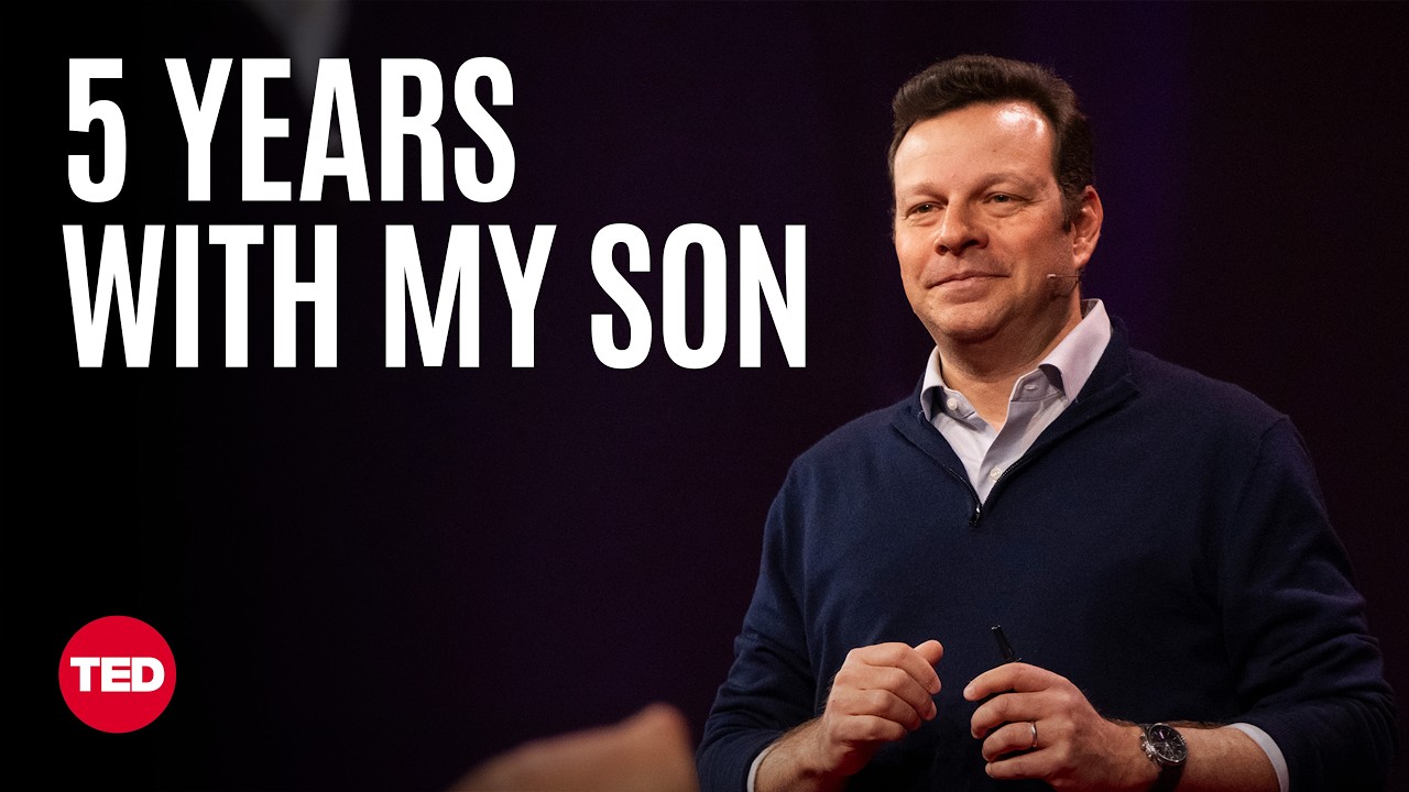 ** Father James G. Robinson speaking on TED stage sharing his son's story
