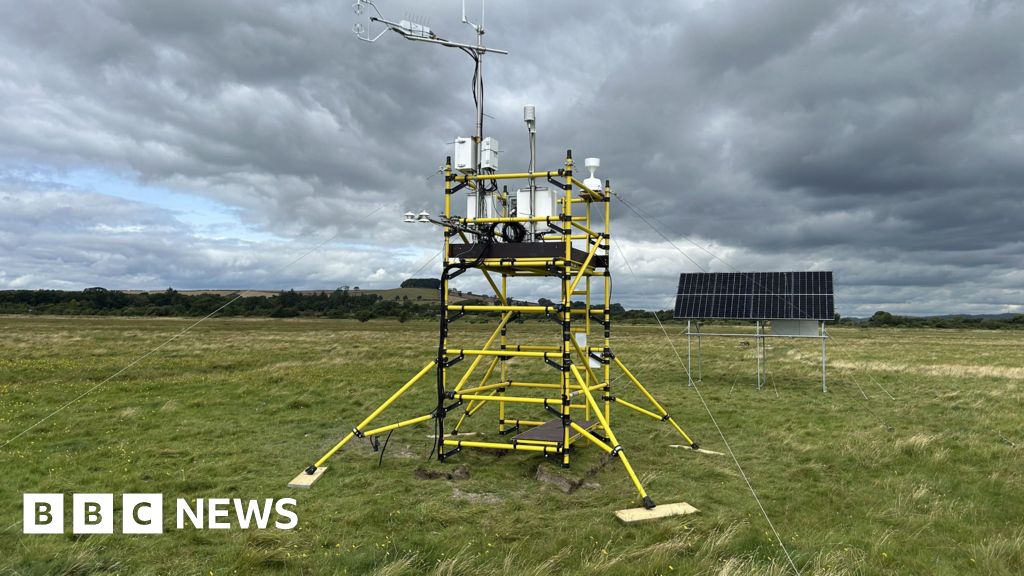 Carbon tracking tower standing in Scotland's Caerlaverock saltmarsh measuring atmospheric carbon dioxide levels