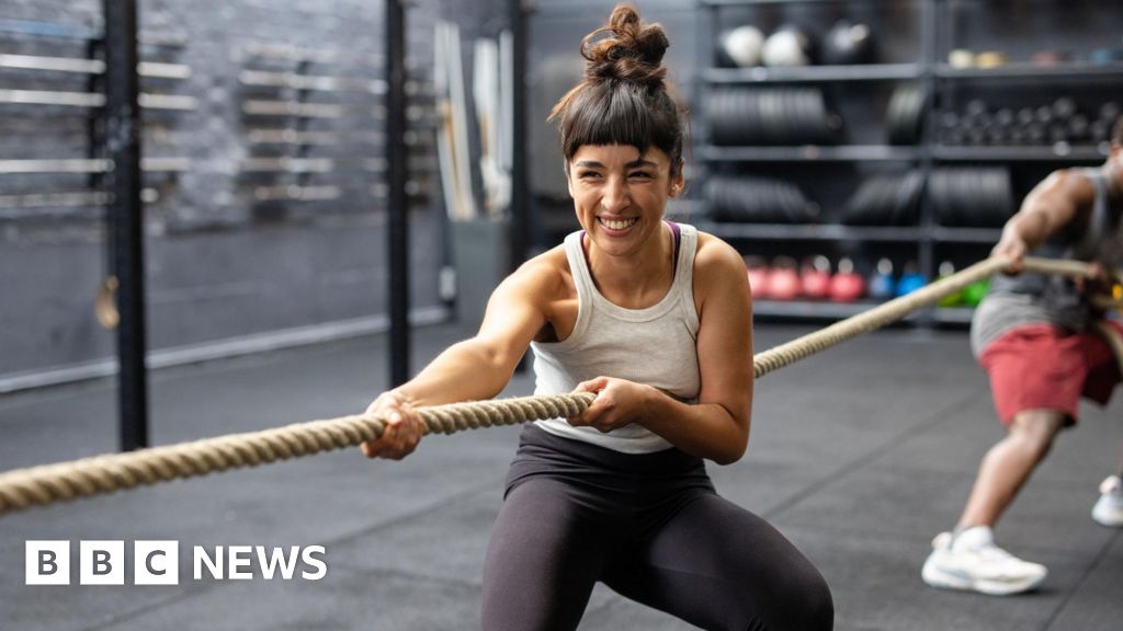 Woman exercising outdoors doing variety of stretching and strength training movements