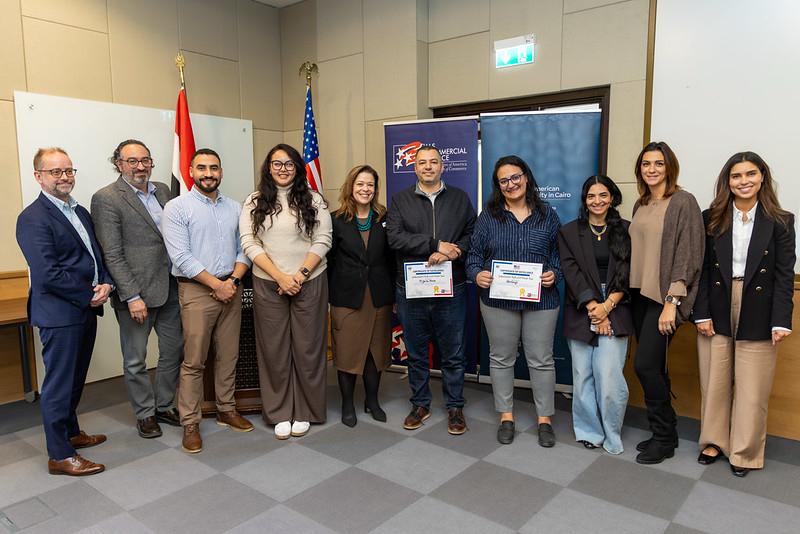 Egyptian entrepreneurs presenting tech startup pitch to panel of judges at Cairo competition