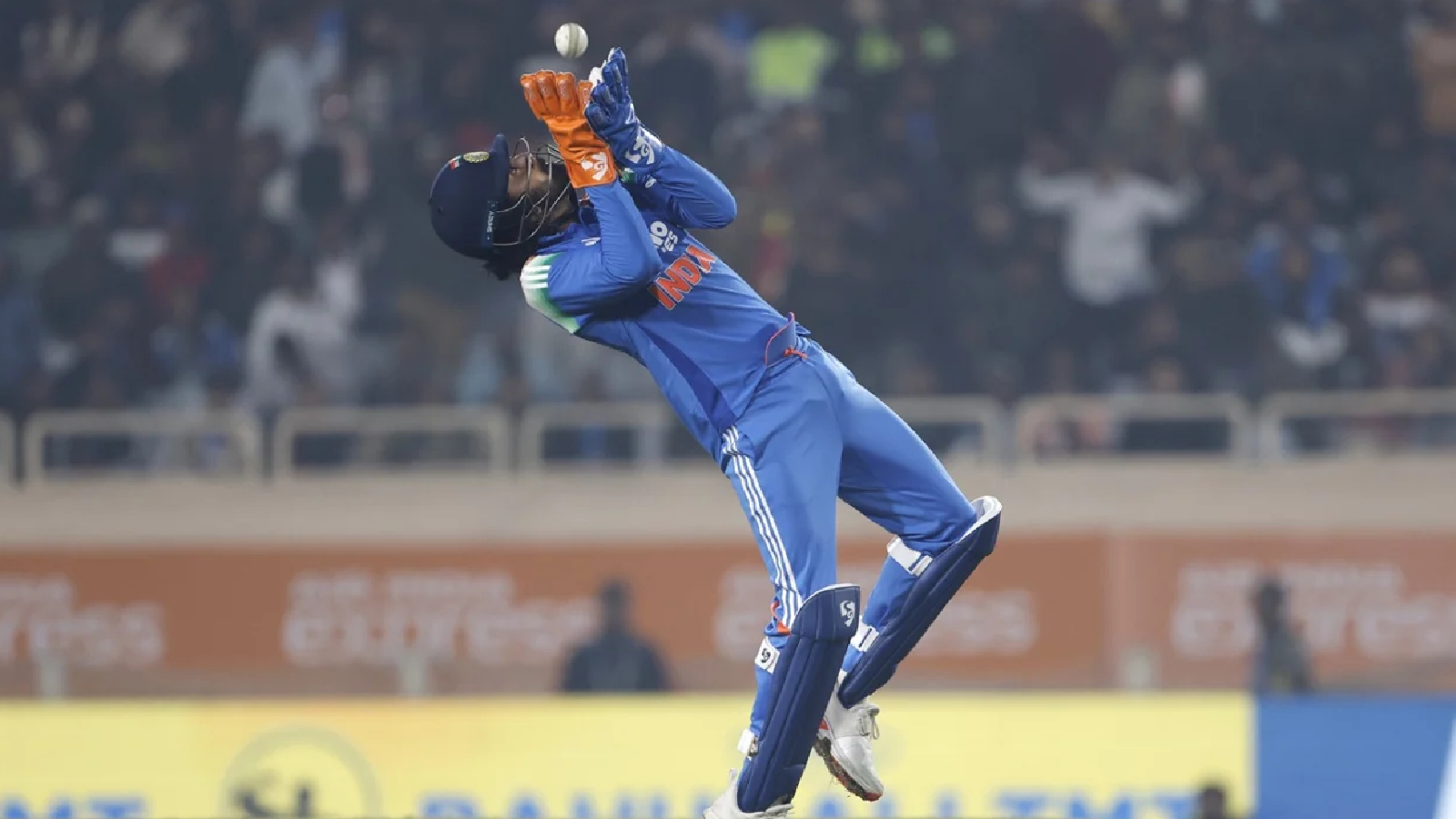** Indian cricket wicketkeeper KL Rahul in white uniform preparing to bat during match