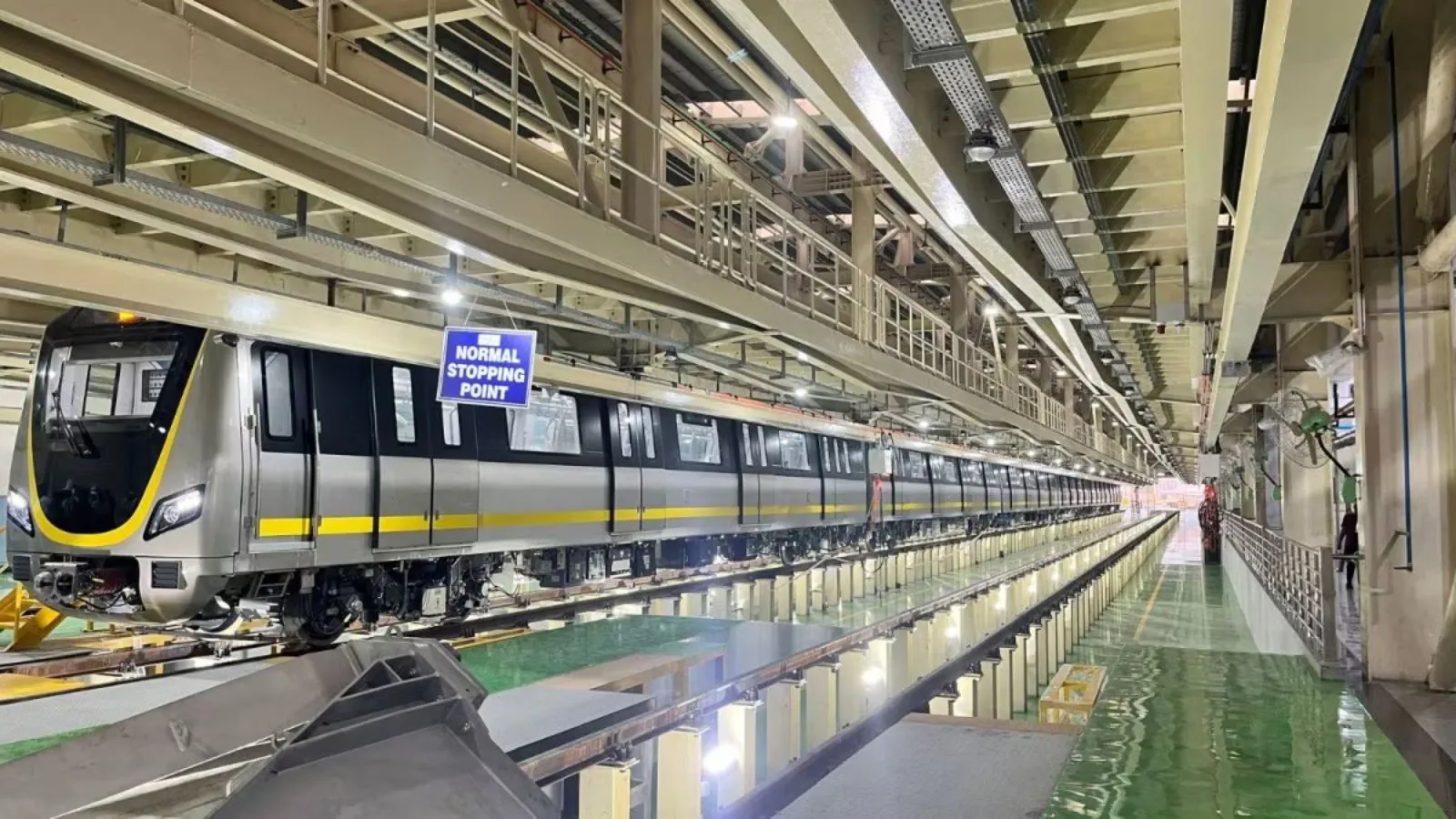 ** Namma Metro train on elevated track in Bangalore, India serving Yellow Line commuters