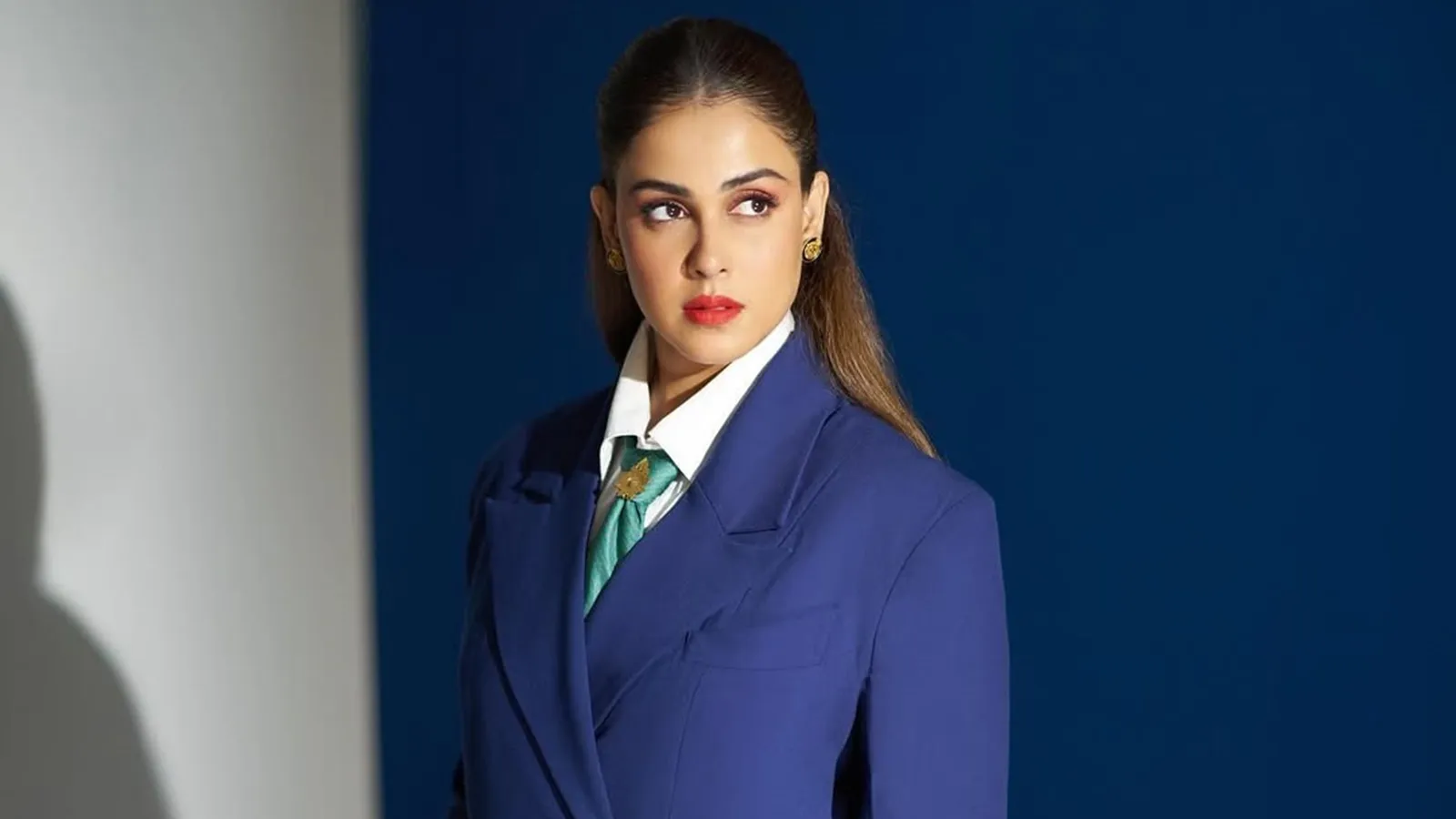 Bollywood actress Genelia D'Souza smiling confidently, promoting open conversation about menopause