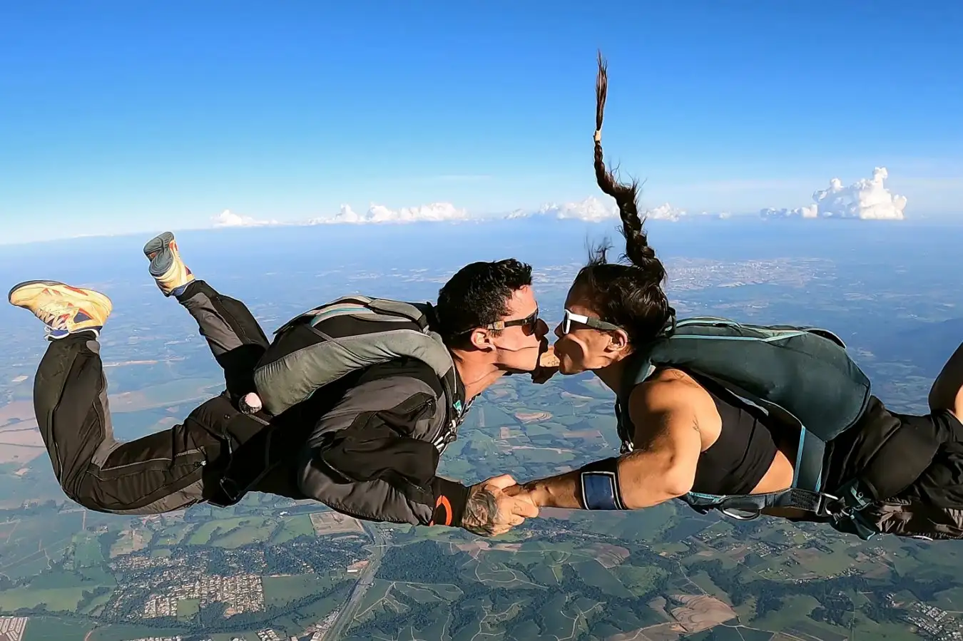 Happy couple trying new outdoor activity together, smiling and enjoying shared experience