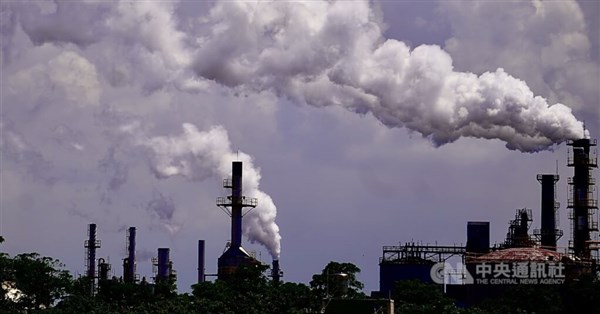 Taiwan industrial facilities with clean energy infrastructure representing carbon fee program success