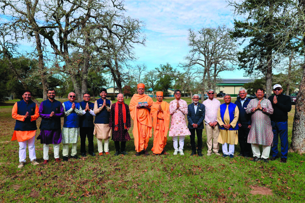 Crowd gathered outside new classroom trailers at Hindu Heritage Youth Camp ribbon cutting ceremony