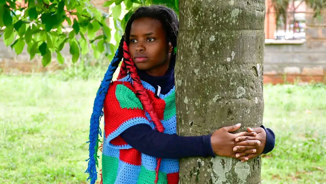 Kenyan Woman Hugs Tree for 72 Hours to Fight Climate Change