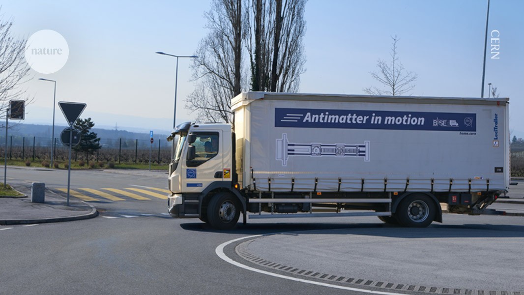 Specialized truck carrying magnetic antimatter bottle driving around CERN particle physics laboratory campus