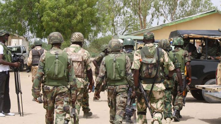 Nigerian military forces conducting operations in forested terrain to rescue captives from terrorist camps