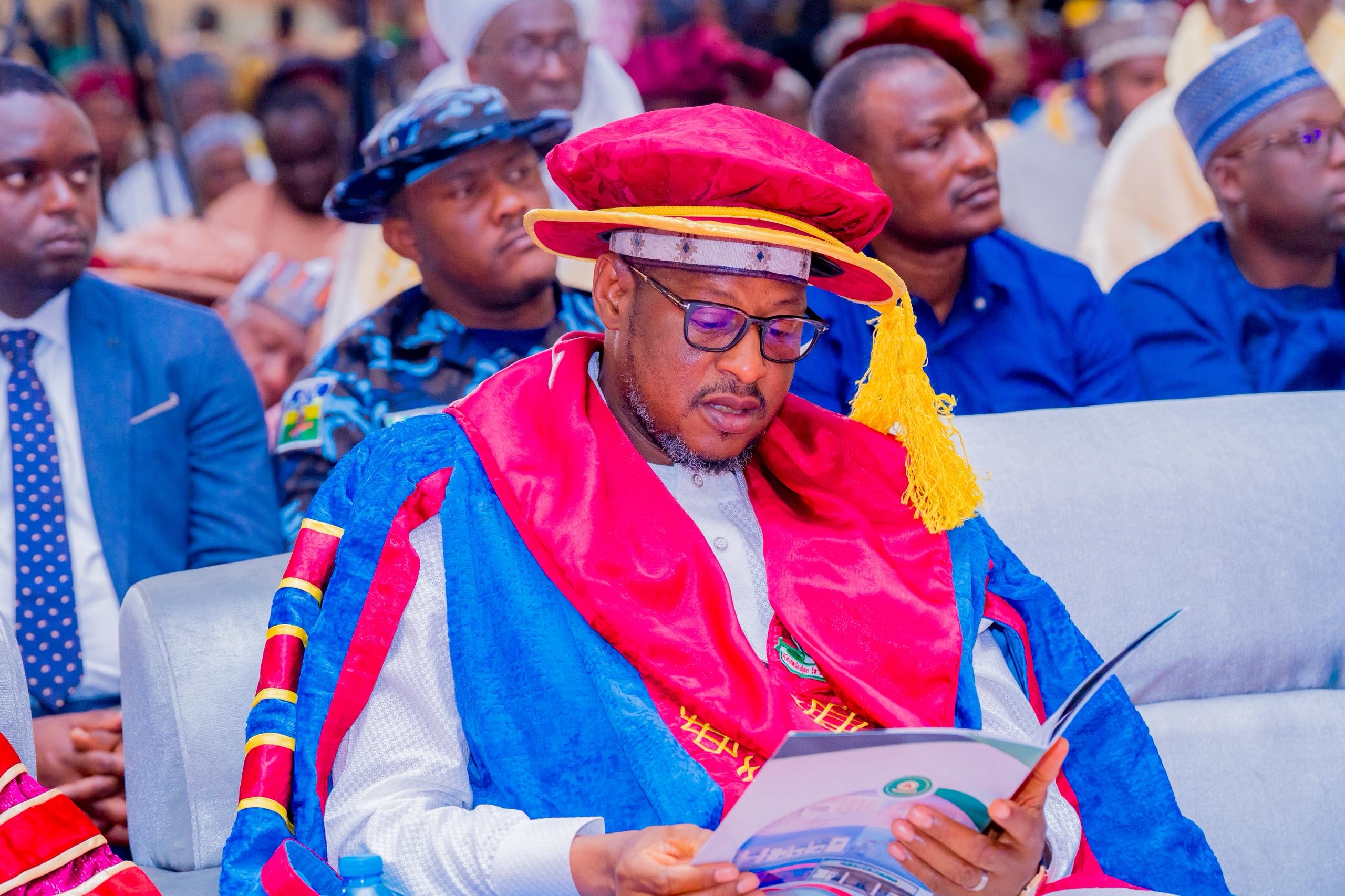 Nigerian students in graduation gowns celebrating at Al-Qalam University convocation ceremony in Katsina State