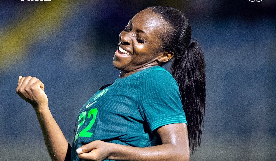 Nigerian Super Falcons women's soccer team celebrating during their Olympic qualifying match victory