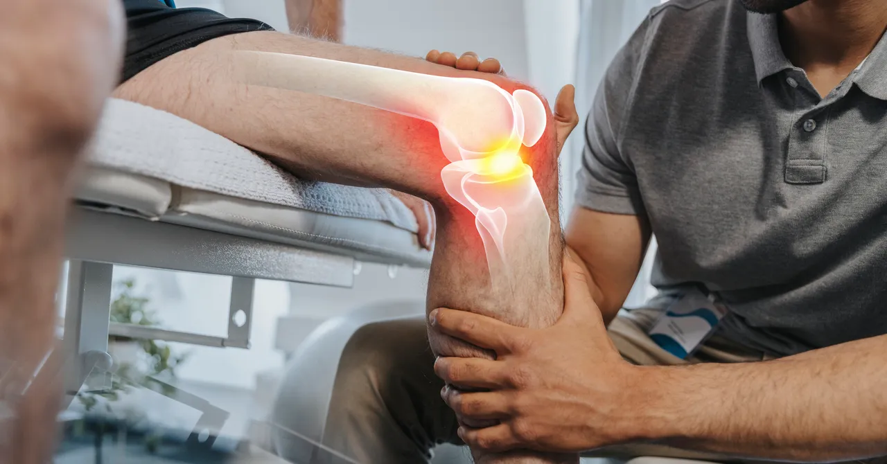 Medical researcher examining regenerative joint therapy injection in laboratory setting
