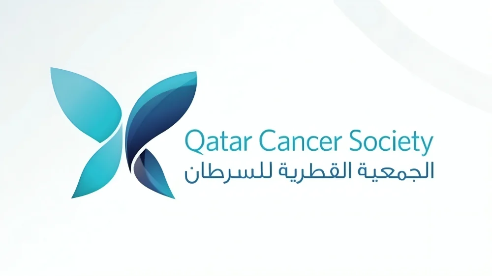 Cancer survivor Mohamed Othman smiling, representing hope and recovery from lymphoma treatment in Qatar