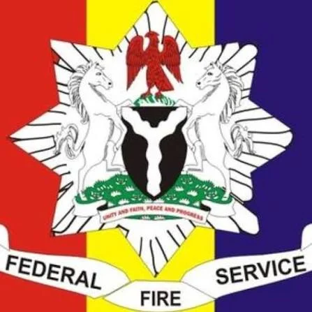 Nigerian firefighters working together to extinguish flames at residential building in Gombe