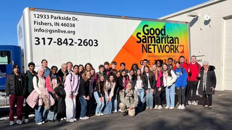 Fishers Youth Academy Volunteers Sort Donations for Neighbors