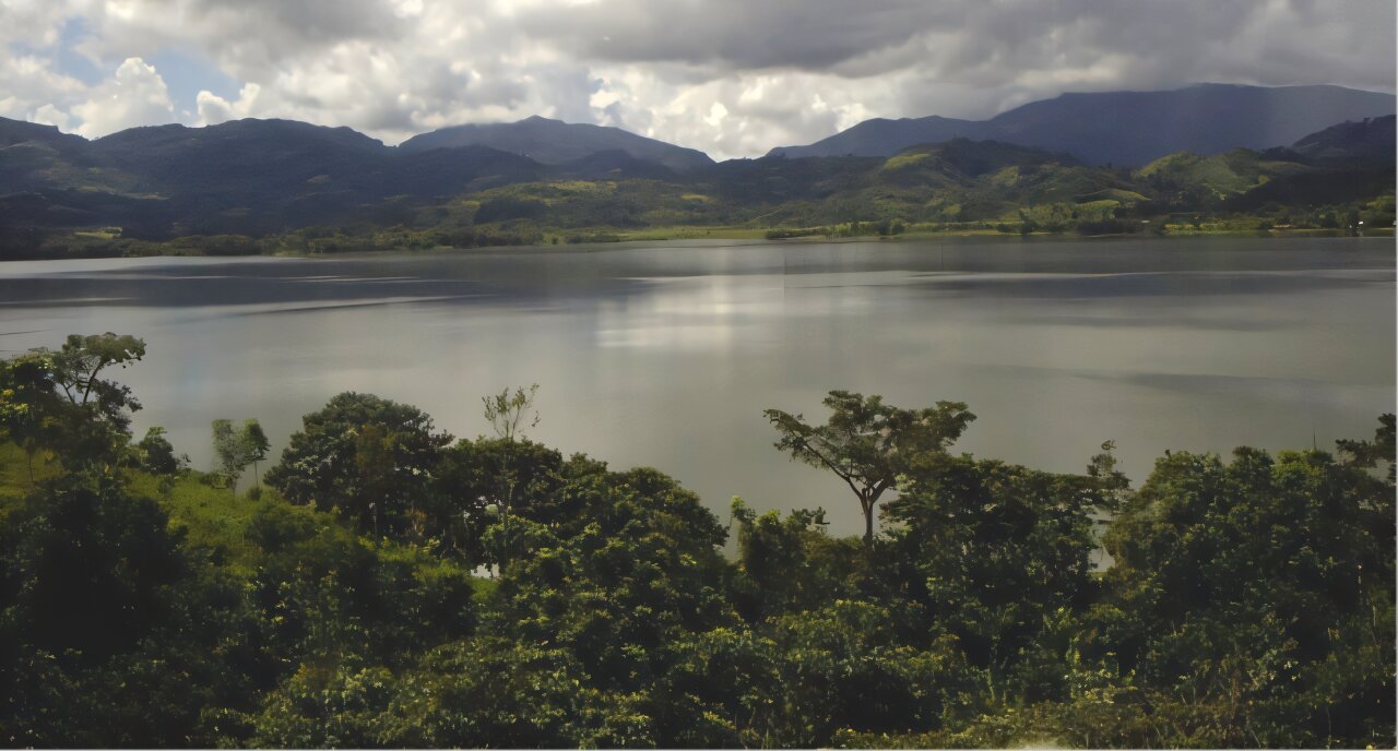 Lake La Yeguada in Panama surrounded by lush green tropical forest and hills