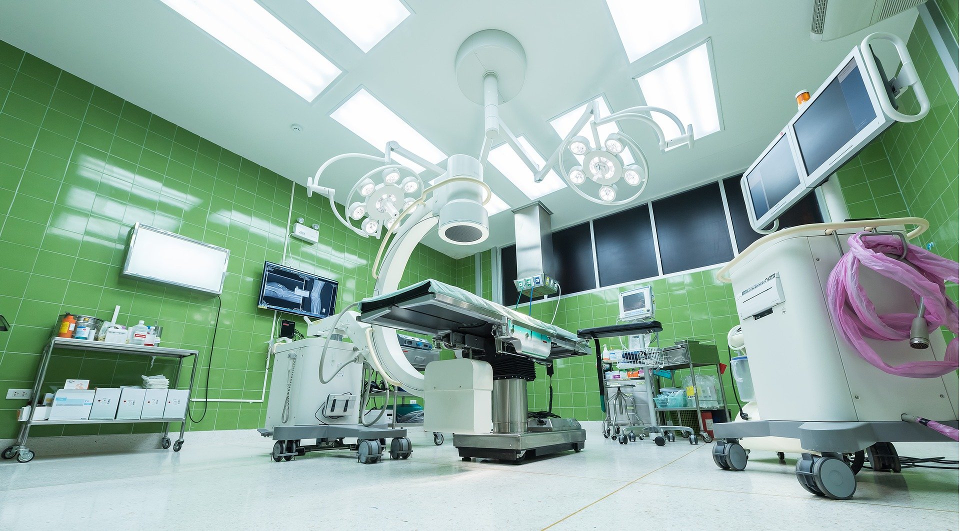 Modern hospital operating room with energy-efficient lighting and sustainable medical equipment