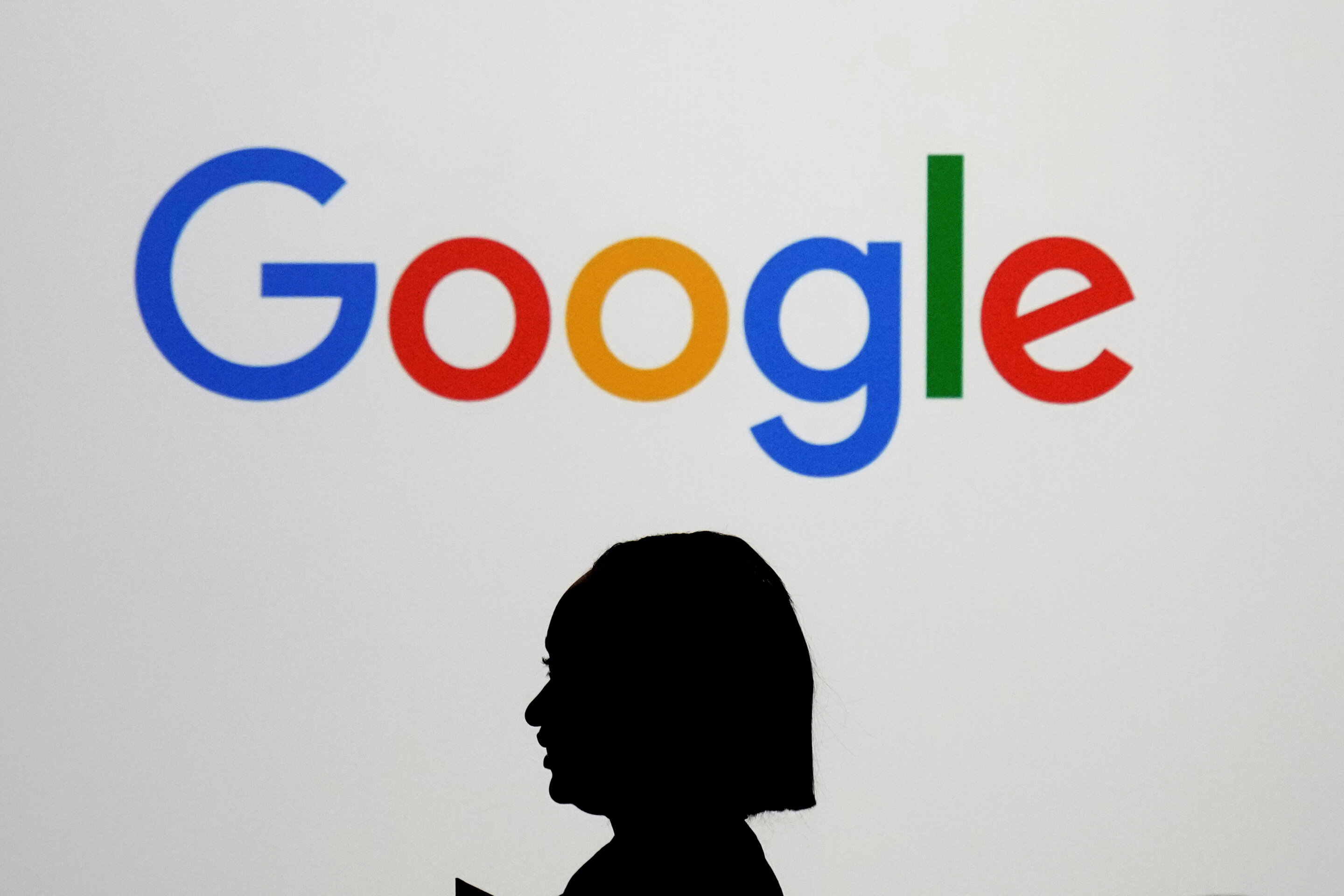 Giant Google logo display screen at Paris technology event in February 2025