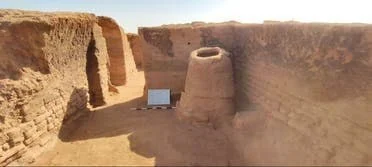 Aerial view of ancient Byzantine city ruins with mud brick buildings in Egyptian desert