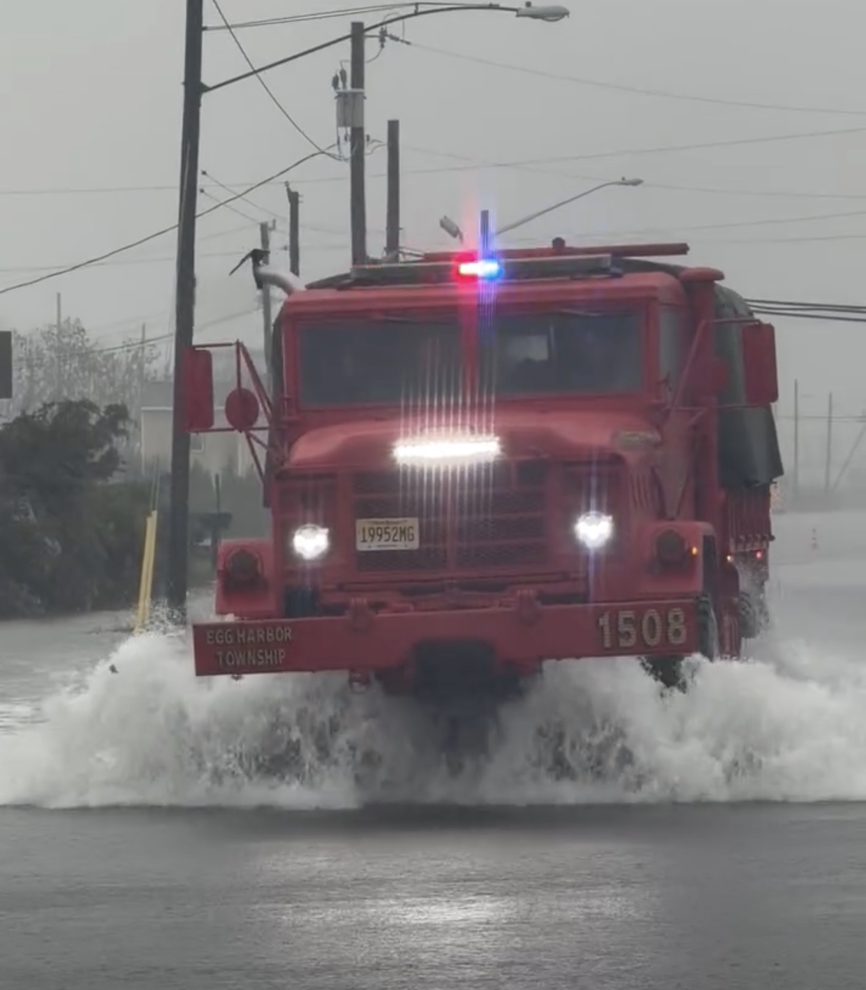 Firefighters Save 9 People and Dog from Flooded Motel