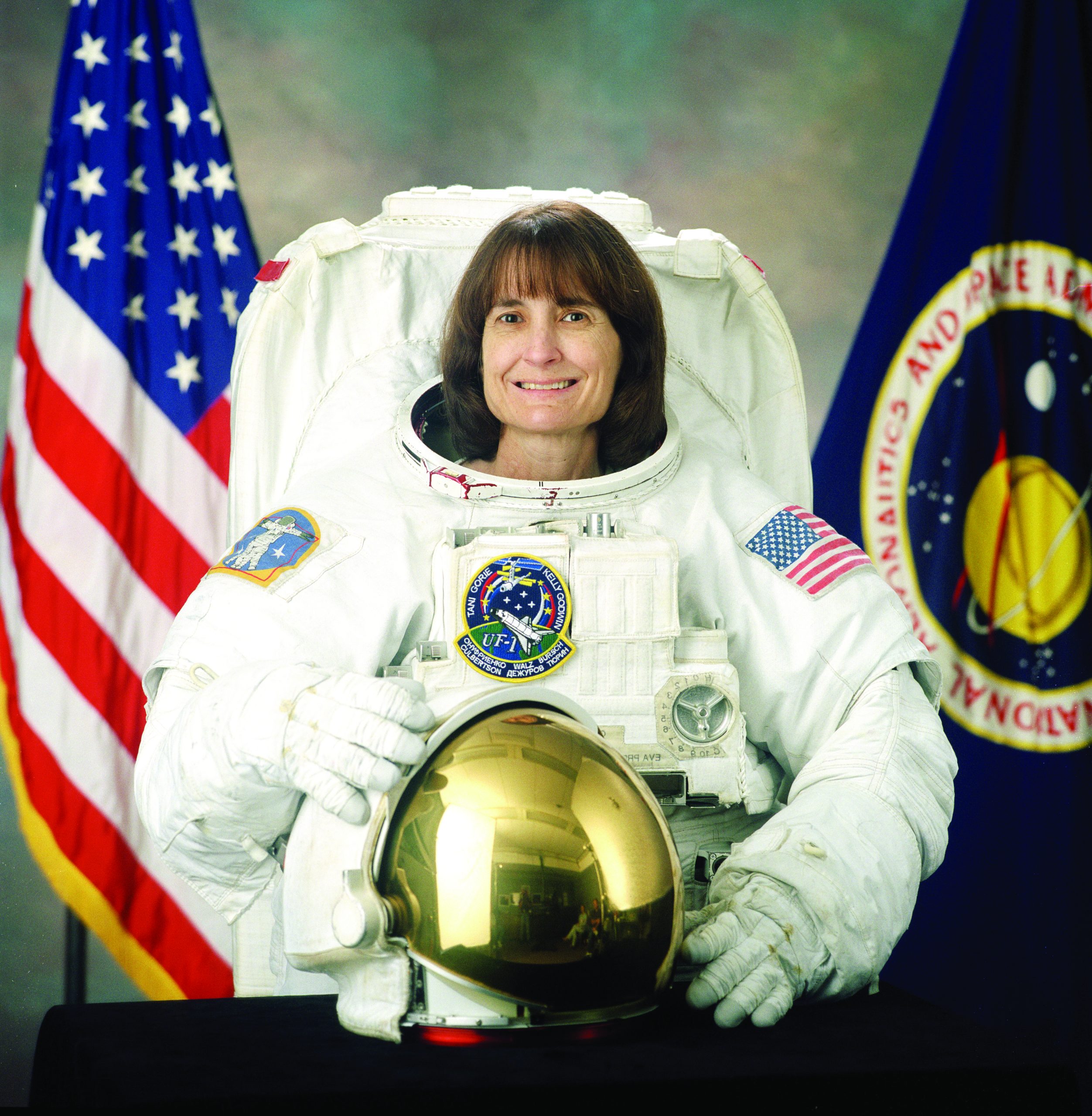 Former NASA astronaut Linda Godwin in space suit during her career with the space agency