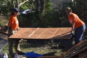 100 Volunteers Rebuild Milton Yards After Hurricane Isaias - Image 2
