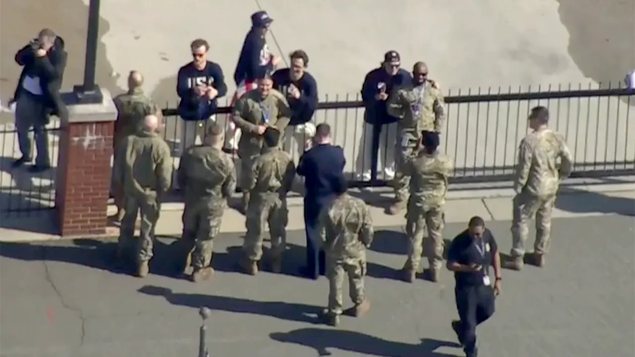 Team USA Hockey Players Share Gold Medals with Troops